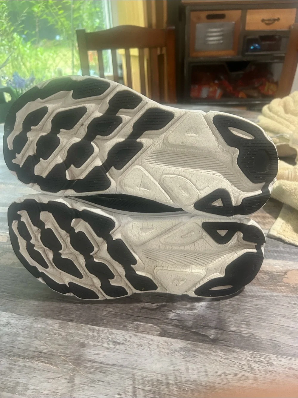 Men's size 11.5D Hoka Black and White Road Running Shoes